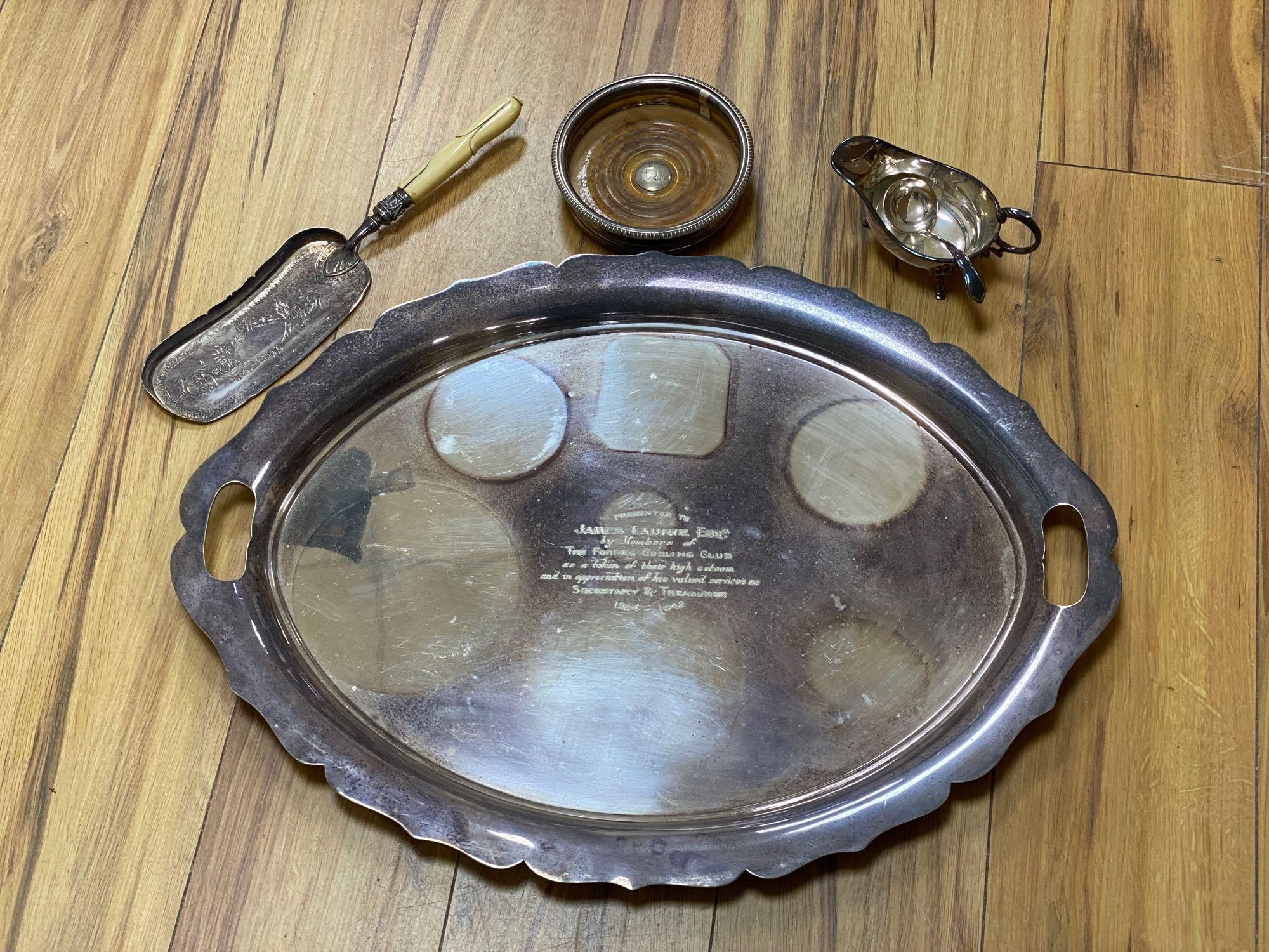 A large Walker & Hall oval plated two handled tea tray, a coaster, a crumb tray and sundry plated wares